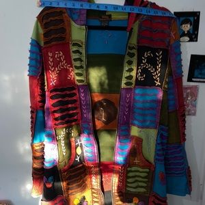 Rising international sweater